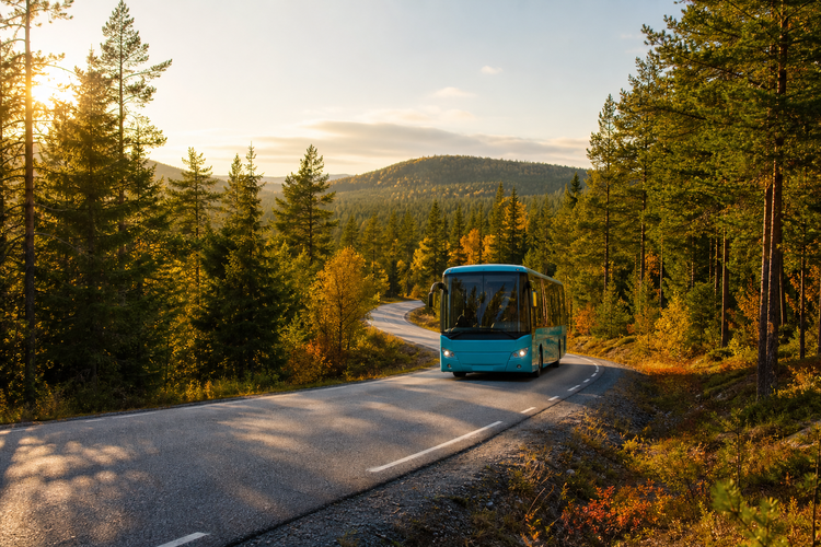 Shuttle Bus Traveling Through Northern Sweden on TreeLined Road-1